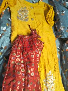 Elegant Yellow Kurta with red skirt
