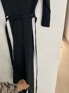 Chic Black Jumpsuit with White Stripes