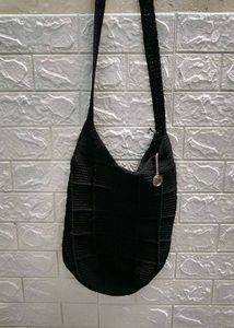 Kathy Ireland Black Woven Sling Bag
