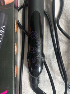 Vega hair straightener