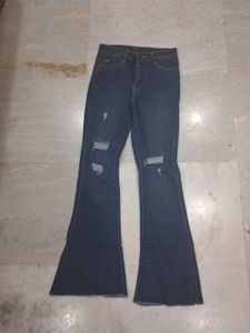 Ripped Flare Jeans - Stylish Denim