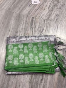 Elegant Green Saree with Silver Border