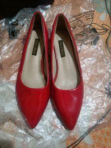 An Unused Pair Of Kitten Heels