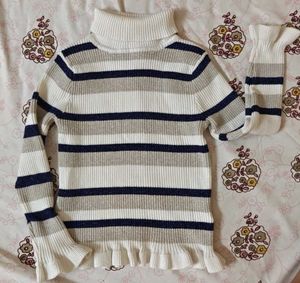 Striped Turtleneck Sweater with Ruffle Trim