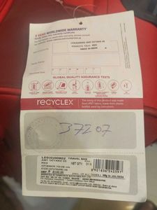 American Tourister Red Spinner Luggage
