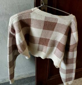 its a short woolen sweater