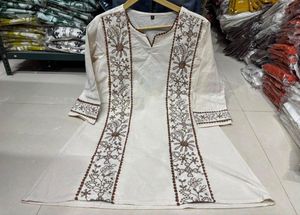 Elegant Beige Embroidered Kurta Set