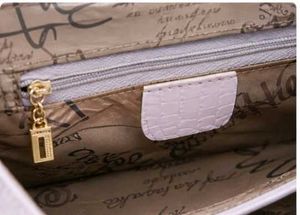 Elegant Pink Croc Embossed Clutch Bag