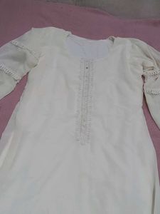 mustard colour plazo and off white top