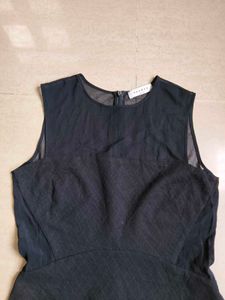 Sheer Black Peplum Top from paris