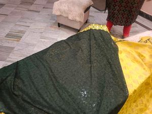 Elegant Yellow Saree with Intricate Border