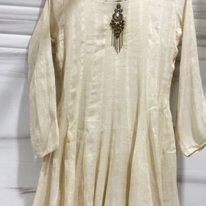 Elegant Cream Kurta Set with Embellished Neckline