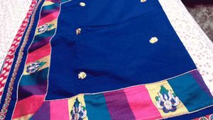 Elegant Blue Saree with Colorful Accents