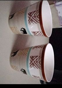 A PAIR OF ELEPHANT DESIGNED MUGS NEW