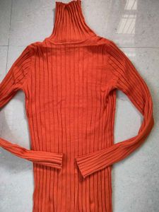 Orange Ribbed Turtleneck Sweater