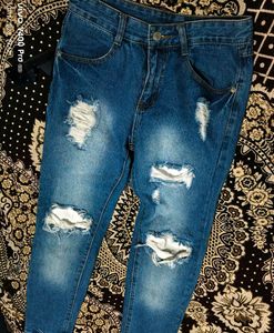 Distressed Blue Denim Jeans