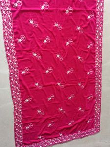 Vibrant Pink Embroidered material