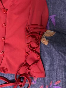 Red Sleeveless Top with Tie Details