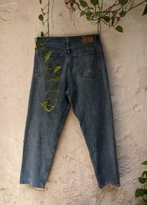 Distressed Blue Denim Jeans