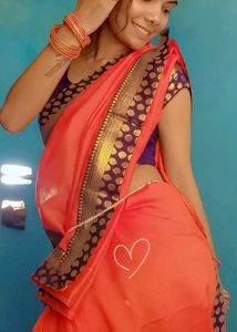 Vibrant Orange Saree with Embellished Border