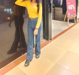 top with jeans both for women