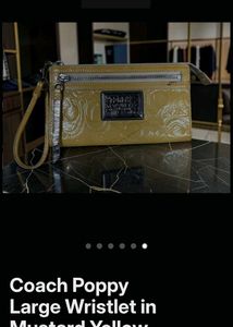 Coach Monogram Wristlet