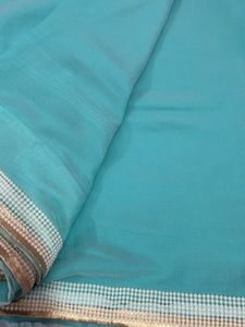 Light Blue Saree With Pearl Border