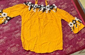 Yellow Off-Shoulder Top with Floral Embellishments