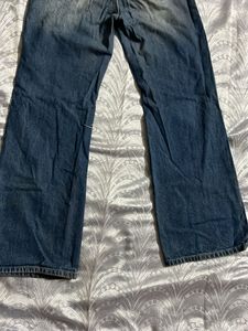 Distressed Wide-Leg Jeans