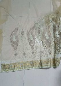 Grand netted tan and coffee brown saree