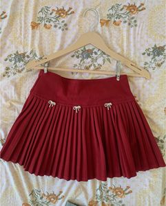 Red Pleated Skirt with Bows