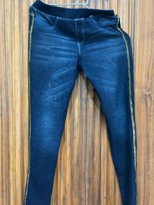 Stylish Dark Wash Jeans with Gold Stripe