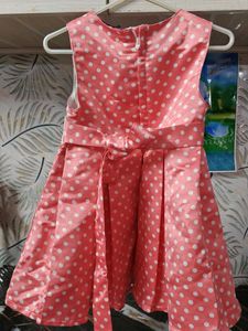 Cute peach Pink Polka Dot satin frock with Bow