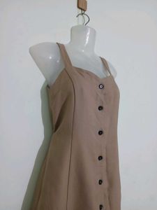 beige sleeveless A-line mini dress