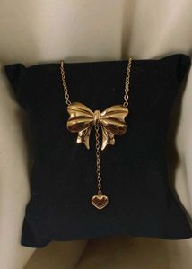 ✨ Golden Bow Elegance Necklace ✨