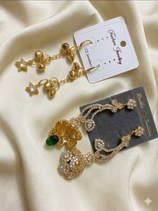 Elegant Gold Earrings with Green Stone