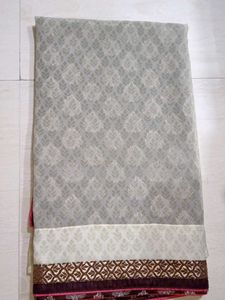 Elegant Brown Saree with Leaf Motifs