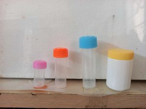 Colorful Topped Small Storage Tubes