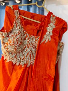 Stunning Orange Embroidered Lehenga Choli