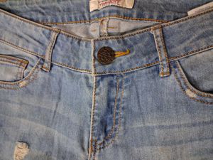 Distressed Blue Denim Jeans