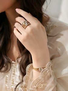 Sparkling Gold Band Ring with Diamonds