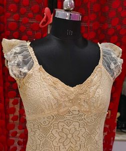 Sheer Lace Peplum Top