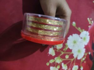 Set of 4 Intricately Carved Gold Bangles