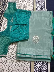 Stunning Teal Saree with Embellished Blouse