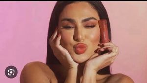 HUDA BEAUTY Cheeky Tint Blush Stick “CORAL CUTIE”