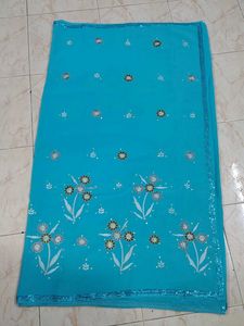 Turquoise Saree with Floral Embellishments