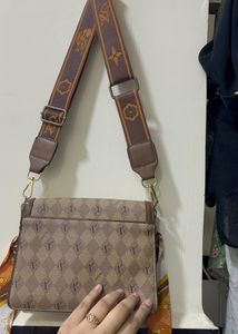 Chic Monogram Shoulder Bag with Scarf Accent