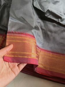 Elegant Grey Saree with Red Border