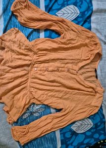Orange Peplum Blouse