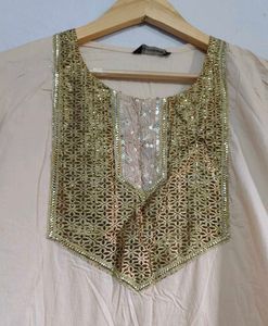 Elegant Cream Kurta with Gold Embellishments